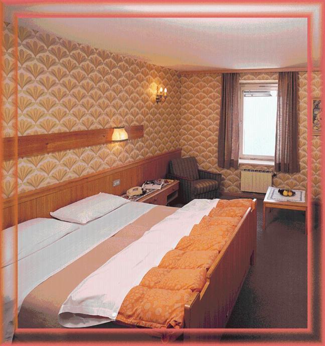 Hotel Passo Stelvio Pokoj fotografie